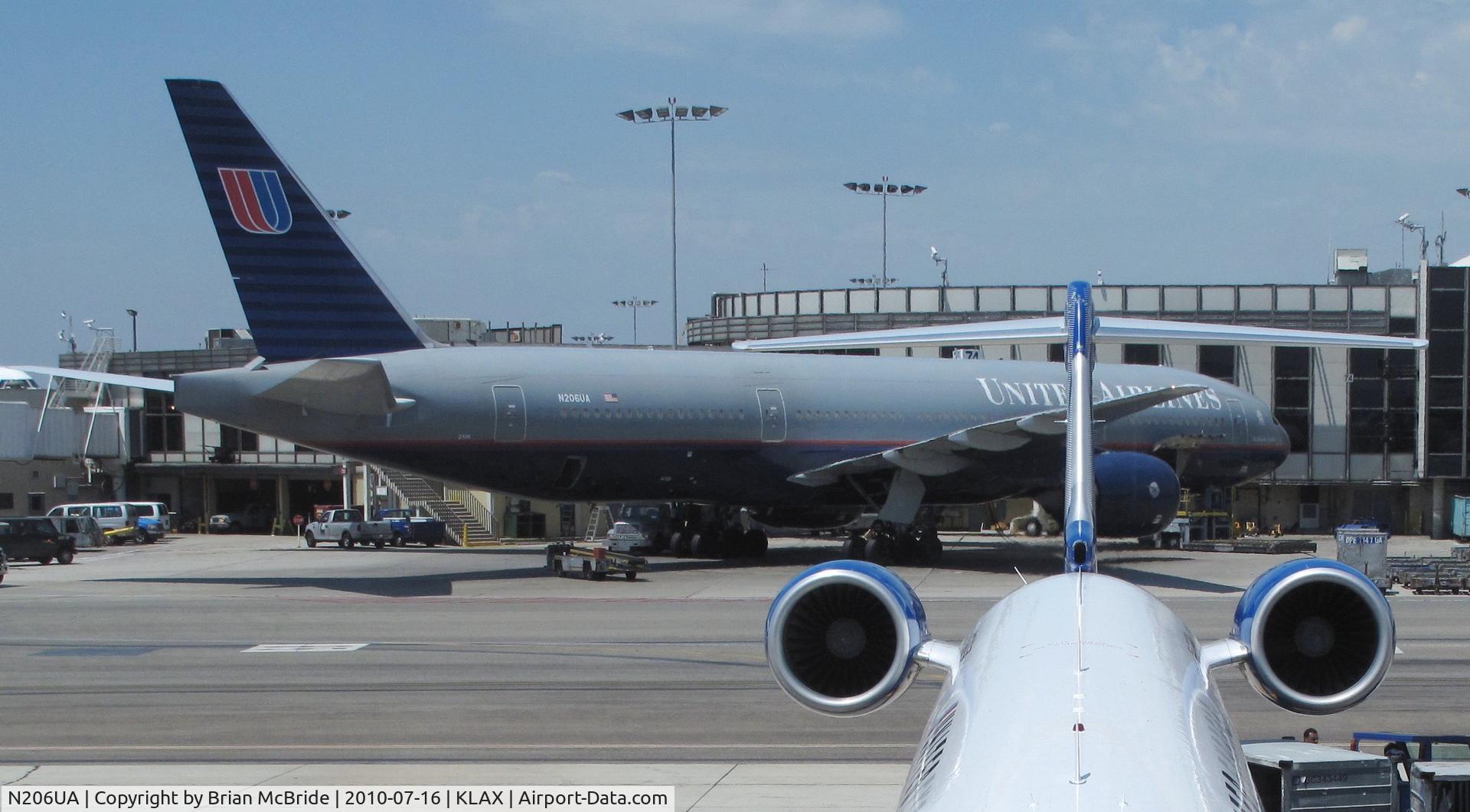 N206UA, 1999 Boeing 777-222/ER C/N 30212, United Airlines. 777-222ER. N206UA 2306 cn 30212 216. Los Angeles - International (LAX KLAX). Image © Brian McBride. 16 July 2010