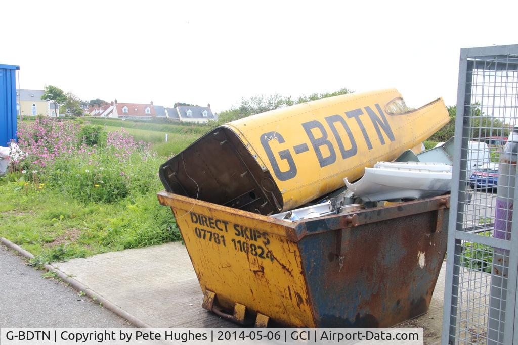 G-BDTN, 1976 Britten-Norman BN-2A Mk.III-2 Trislander C/N 1026, an ignominious end - rear engine section of Trislander G-BDTN in a skip at Guernsey (fuselage in fire training area at Alderney, see separate picture)