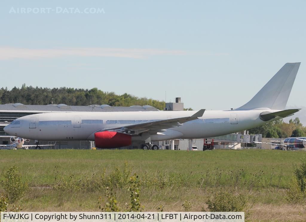 F-WJKG, 2002 Airbus A330-243 C/N 451, Ex. Emirates aircraft stored in all white c/s without titles. Ex. A6-EAJ