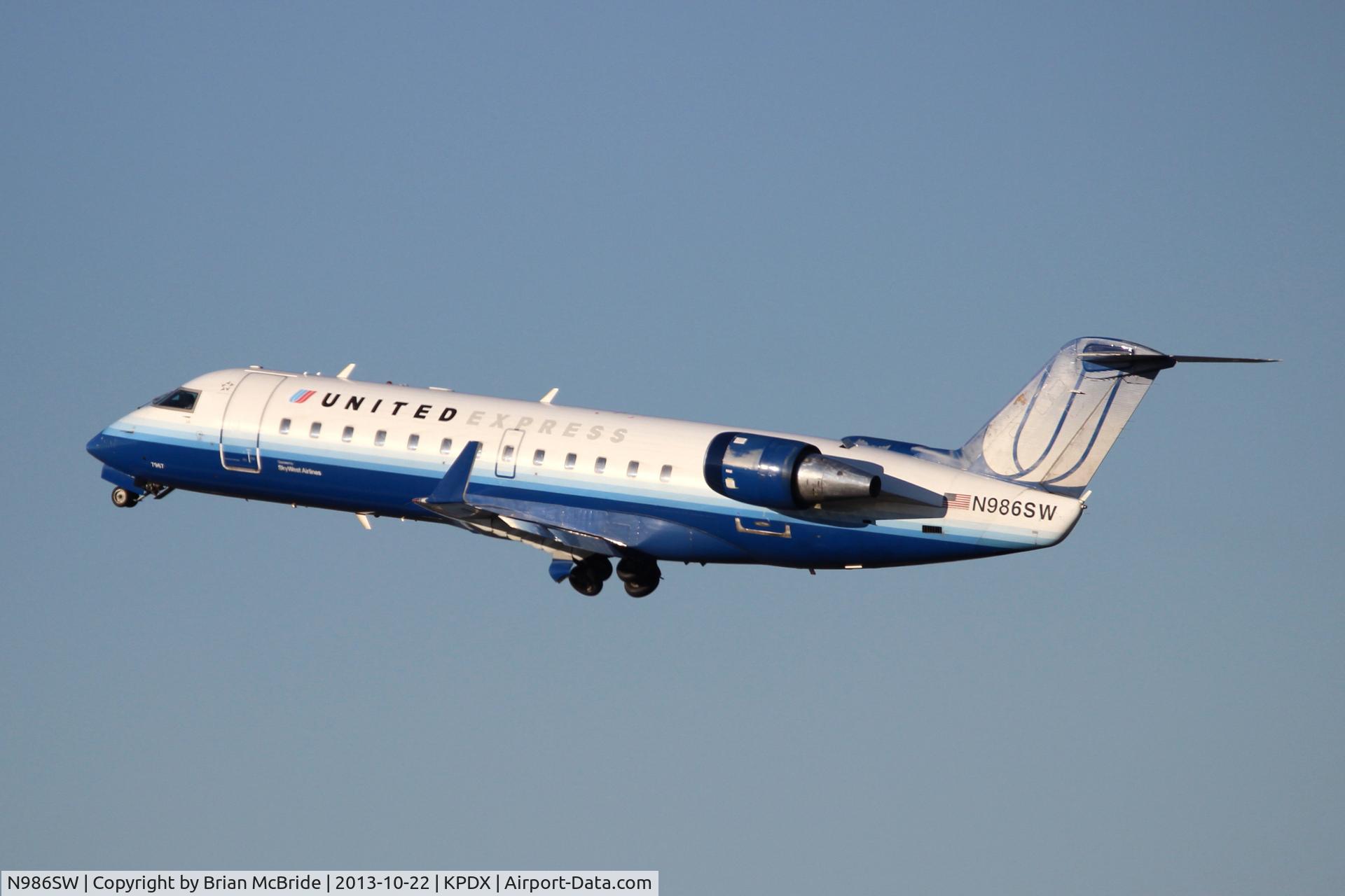 N986SW, 2004 Bombardier CRJ-200ER (CL-600-2B19) C/N 7967, United Express (SkyWest Airlines). Canadair CL-600-2B19 Regional Jet CRJ-200LR. N986SW cn 7967. Portland - International (PDX KPDX). Image © Brian McBride. 22 October 2013