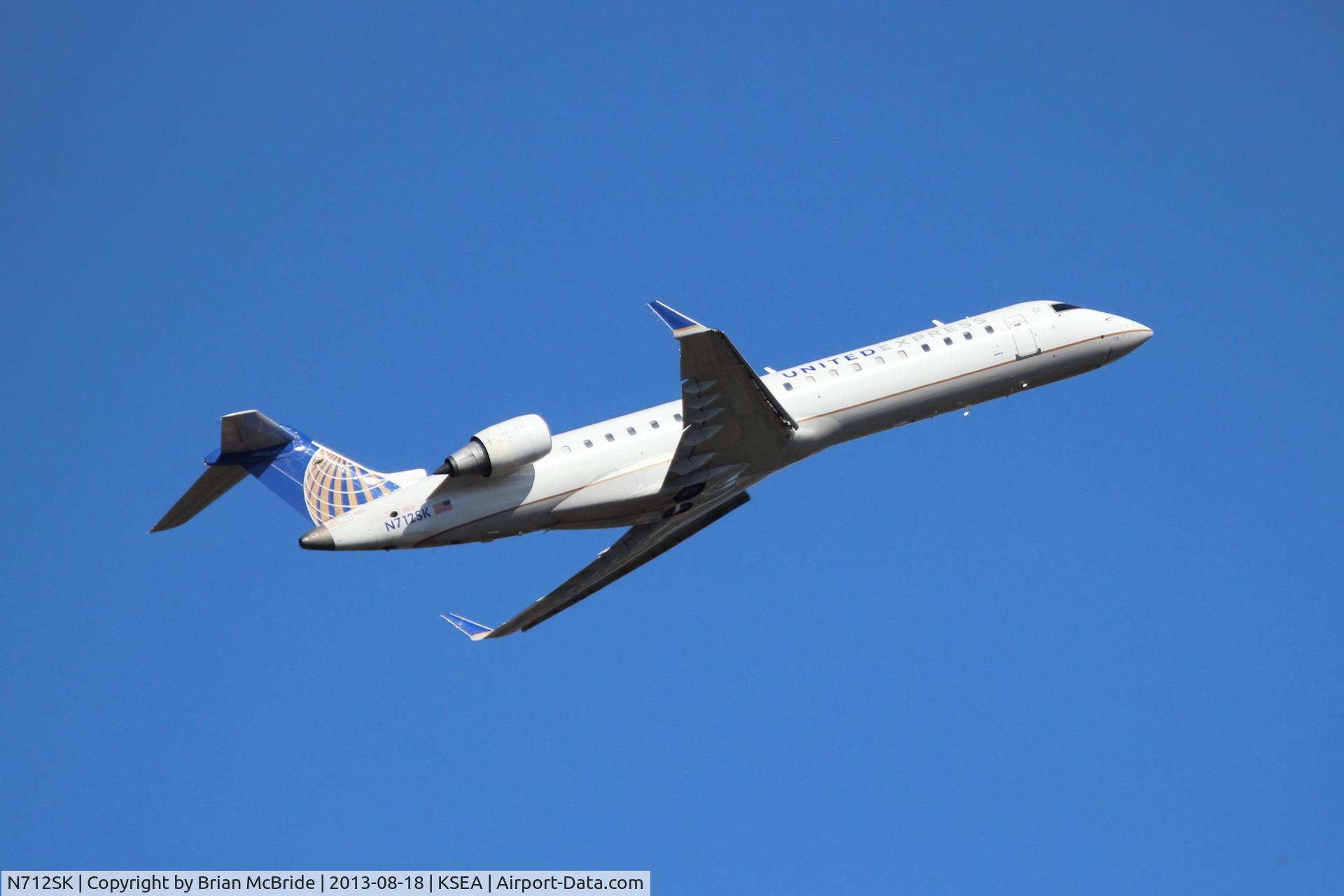 N712SK, 2004 Bombardier CRJ-700 (CL-600-2C10) Regional Jet C/N 10172, United Express (SkyWest Airlines). Canadair CL-600-2C10 Regional Jet CRJ-700. N712SK cn 10172. Seattle Tacoma - International (SEA KSEA). Image © Brian McBride. 18 August 2013