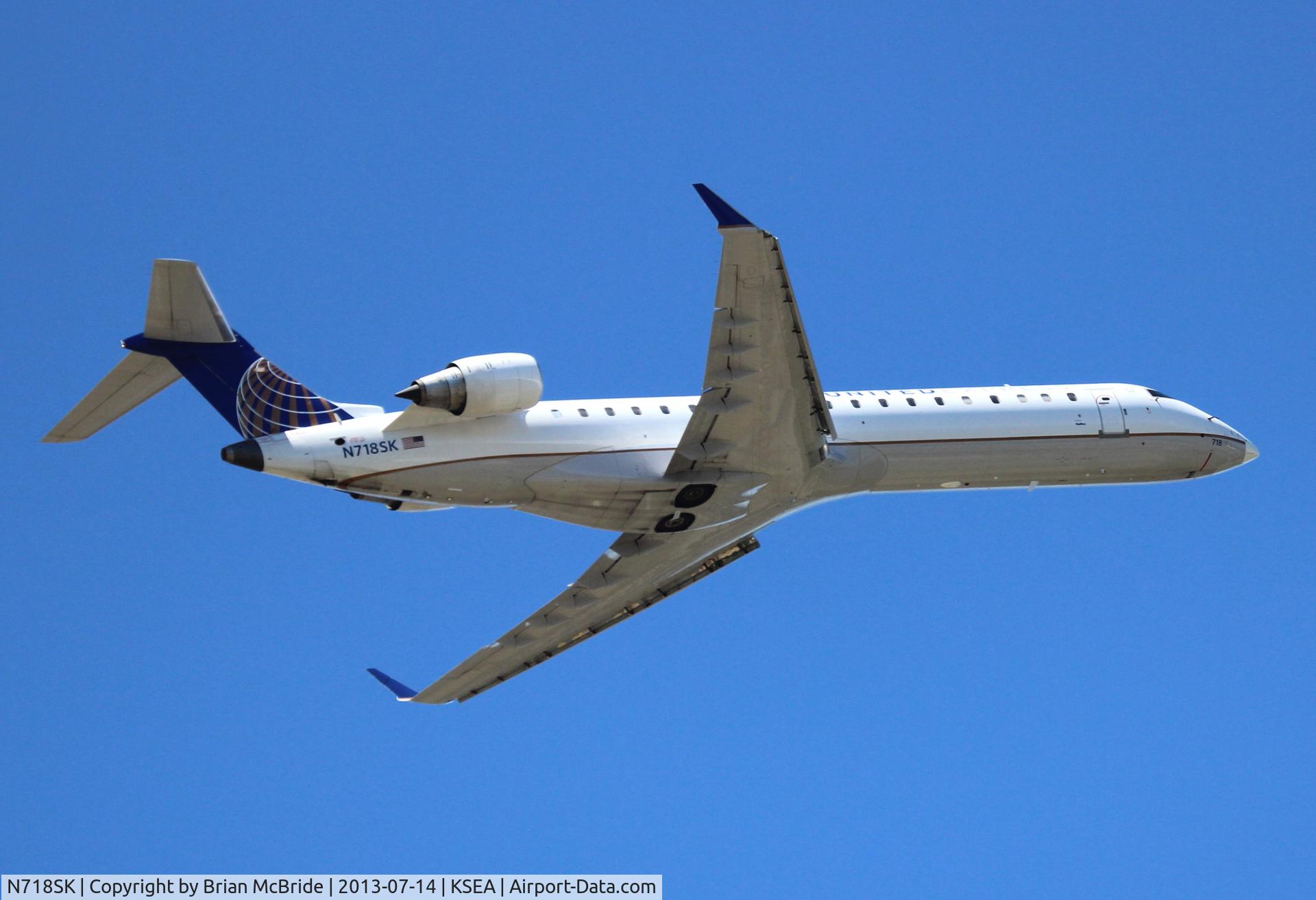 N718SK, 2004 Bombardier CRJ-701 (CL-600-2C10) Regional Jet C/N 10184, United Express (SkyWest Airlines). Canadair CL-600-2C10 Regional Jet CRJ-700. N718SK cn 10184. Seattle Tacoma - International (SEA KSEA). Image © Brian McBride. 14 July 2013