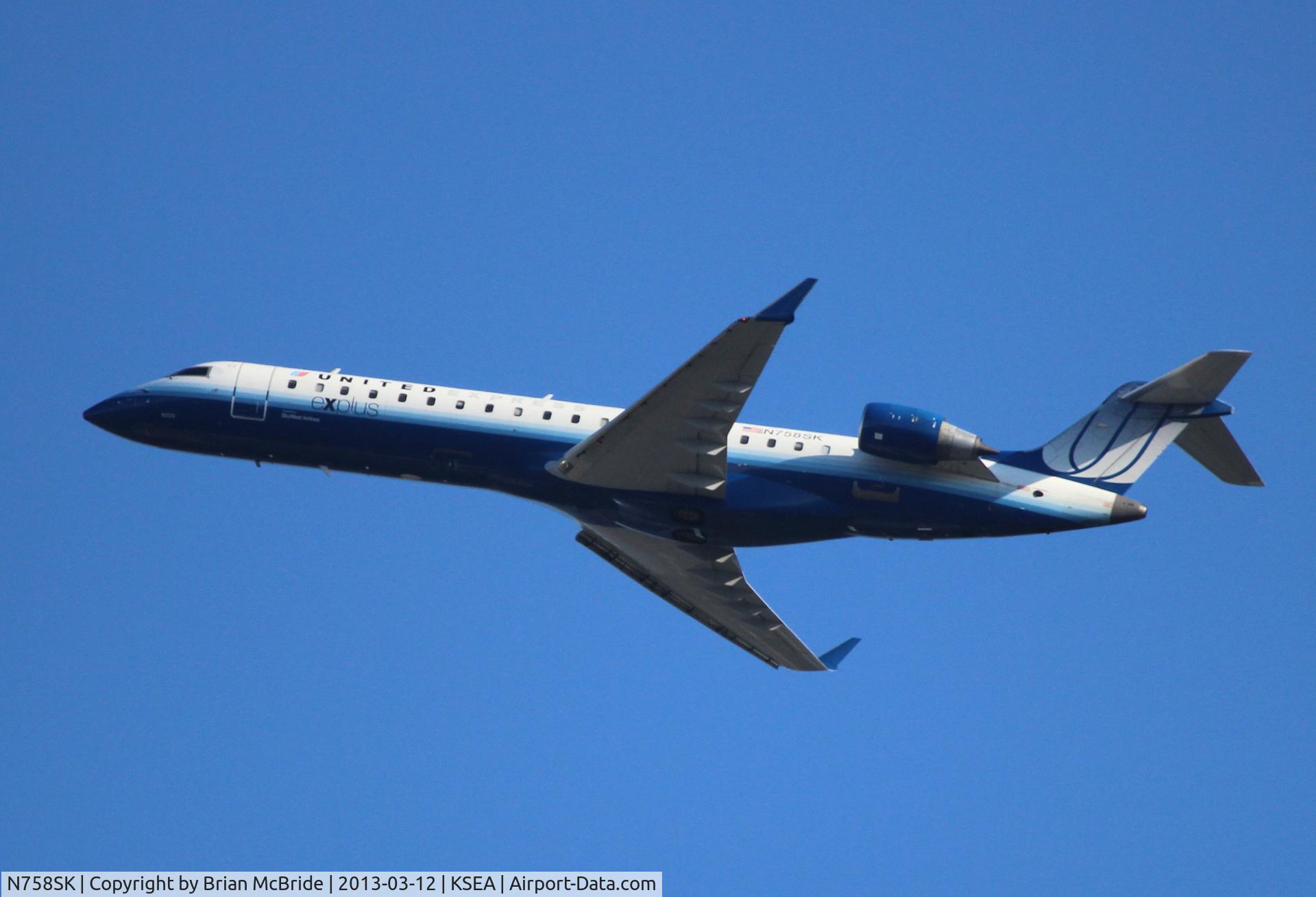 N758SK, 2005 Bombardier CRJ-701ER (CL-600-2C10) Regional Jet C/N 10222, United Express (SkyWest Airlines). Canadair CL-600-2C10 Regional Jet CRJ-700. N758SK cn 10222. Seattle Tacoma - International (SEA KSEA). Image © Brian McBride. 12 March 2013