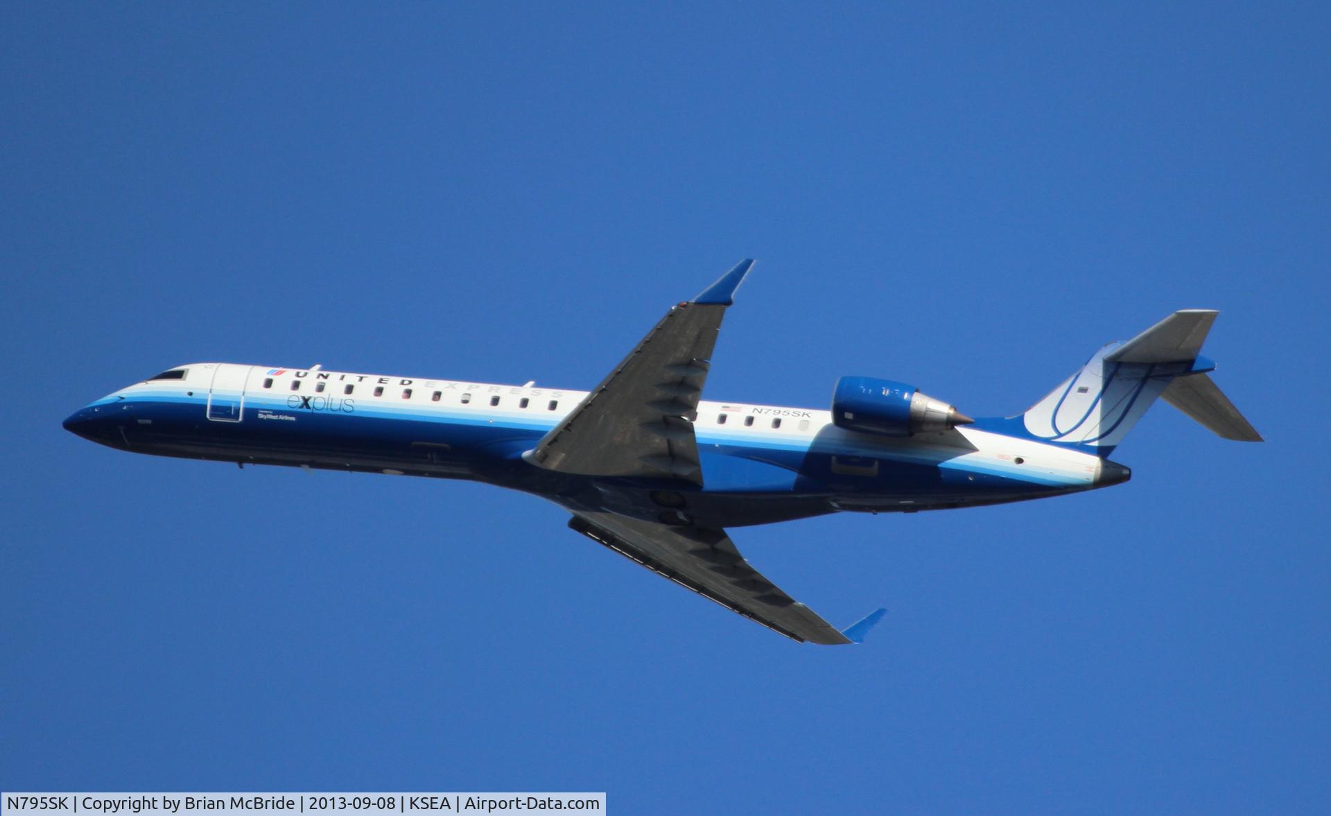 N795SK, 2010 Bombardier CRJ-700 (CL-600-2C10) Regional Jet C/N 10299, United Express (SkyWest Airlines). Canadair CL-600-2C10 Regional Jet CRJ-702. N795SK cn 10299. Seattle Tacoma - International (SEA KSEA). Image © Brian McBride. 08 September 2013