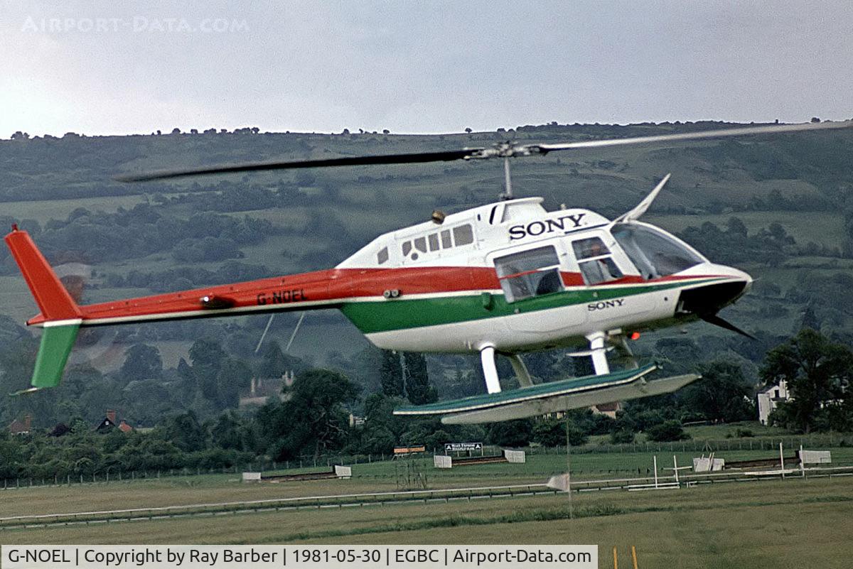 G-NOEL, 1975 Agusta AB-206B JetRanger II C/N 8435, Agusta-Bell AB.206B Jet Ranger II [8435] Cheltenham Racecourse~G 30/05/1981. Seen here being flown  by Noel Edmunds at this fun day. Taken from a slide.