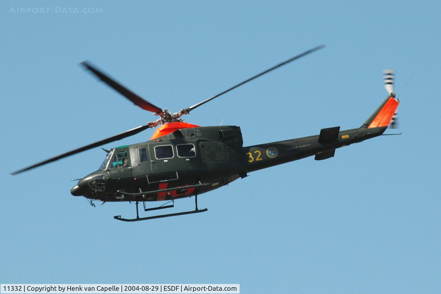 11332, Agusta Hkp11 (AB-412SP) C/N 25802, Hkp11 helicopter of the Swedish Defense Helicopter Fleet flying over Ronneby Air Base.