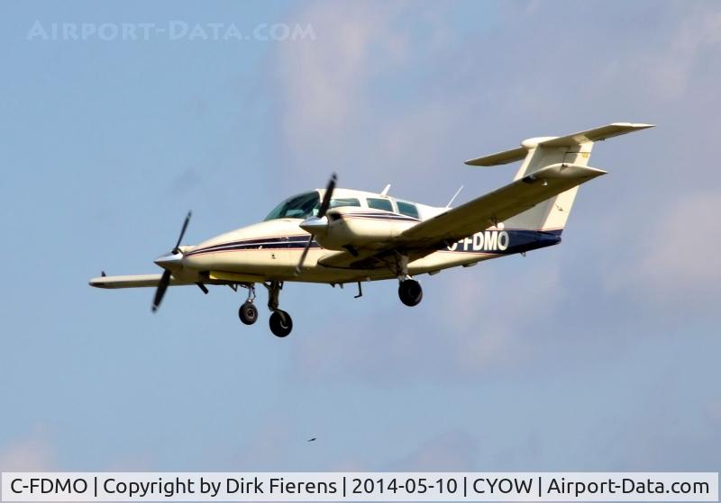 C-FDMO, 1978 Beech 76 Duchess C/N ME-83, Approaching rwy 25 in the mid morning.