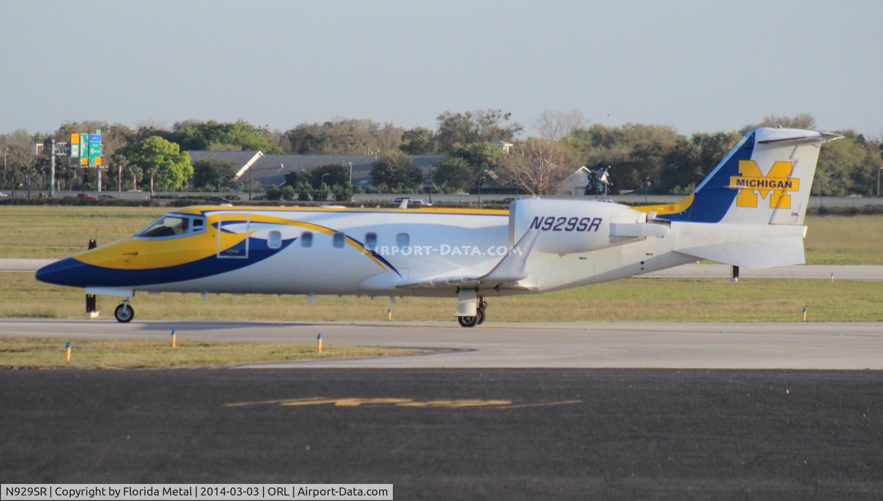 N929SR, 1998 Learjet Inc 60 C/N 144, Lear 60 wearing the colors of the best school ever