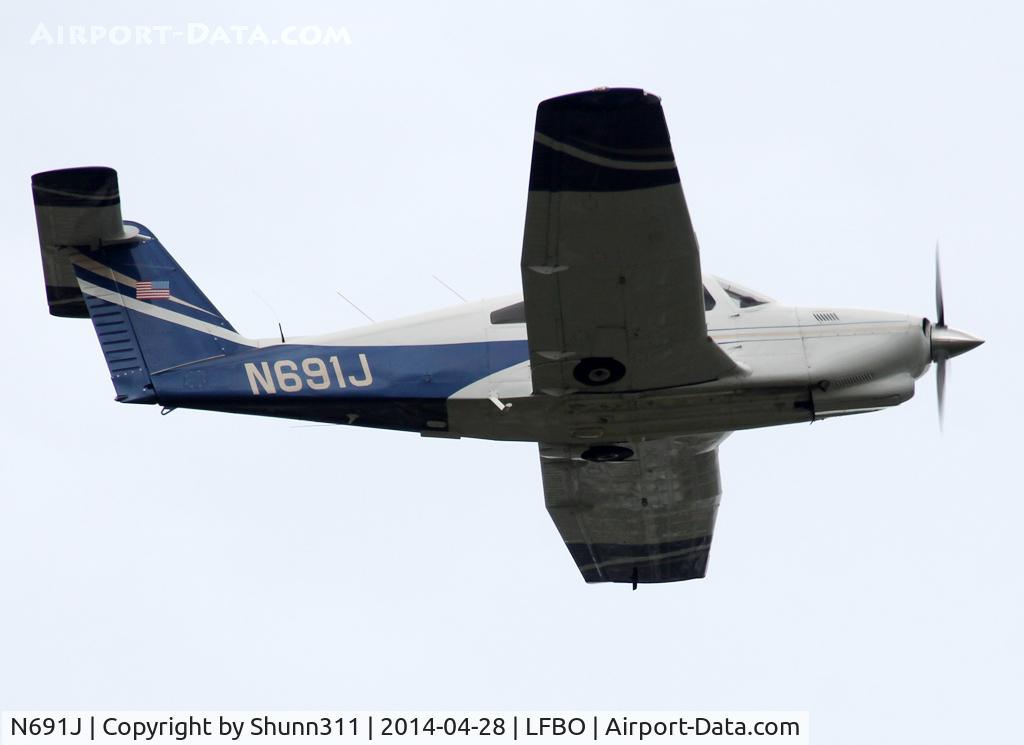 N691J, 1987 Piper PA-28RT-201T Arrow IV C/N 28R-8631003, Climbing after take off from rwy 32R