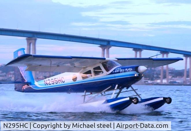 N295HC, 1966 Helio H-295-1200 Super Courier C/N 1217, Originally N6323V rereg 1989, Picture taken at San Diego Harbor Coronado bridge in background.