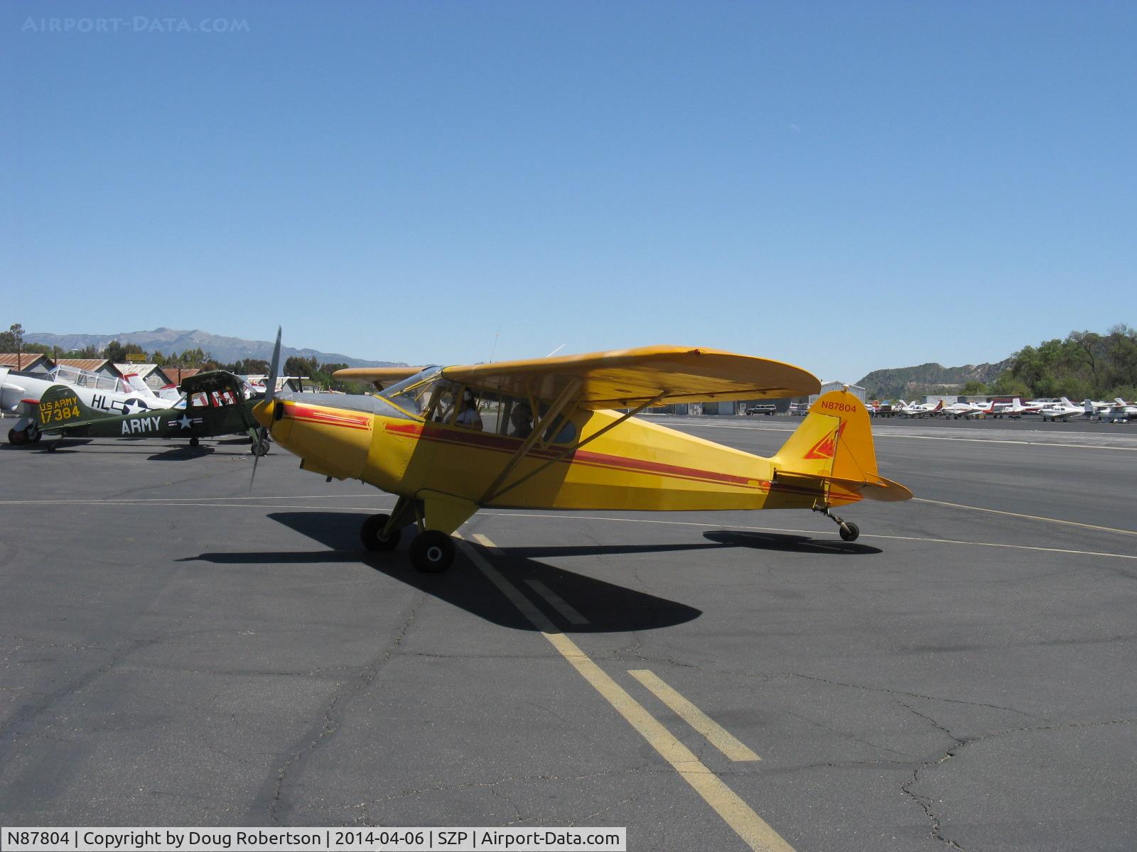 N87804, 1946 Piper PA-12 Super Cruiser C/N 12-5, 1946 Piper PA-12 SUPER CRUISER, Lycoming O-290 125 Hp upgrade, Alaska visitor flown by young lady, taxi to refuel after landing Rwy 22