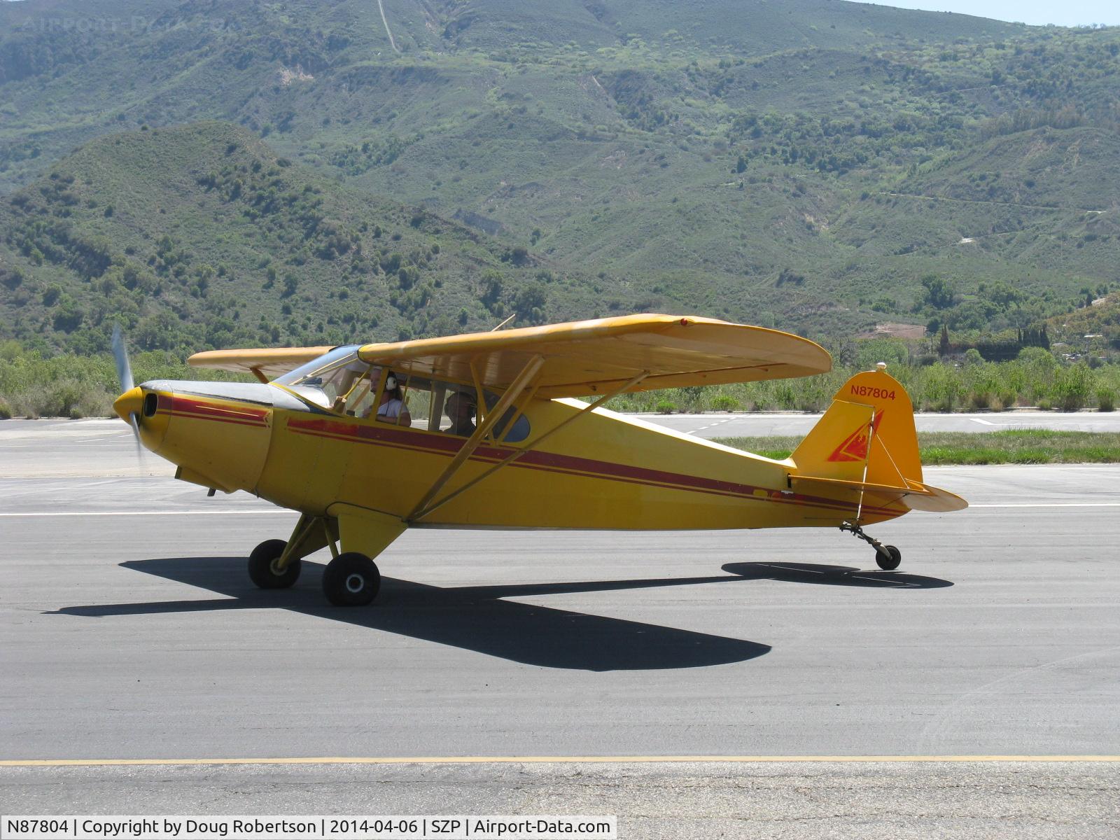 N87804, 1946 Piper PA-12 Super Cruiser C/N 12-5, 1946 Piper PA-12 SUPER CRUISER, Lycoming O-290 125 Hp upgrade, Alaska visitor flown by young lady, taxi back after landing Rwy 22