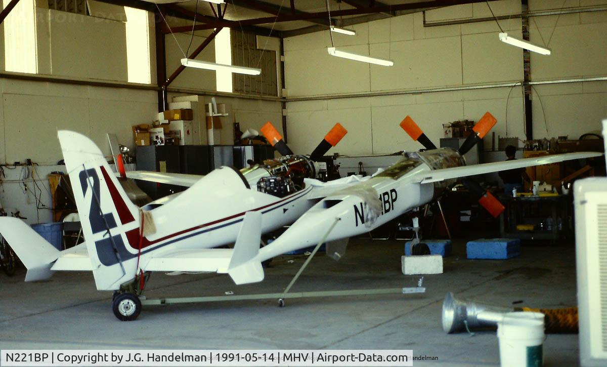 N221BP, Payne Ben P1 C/N G001, Bob Pond Racer in maintenance at a happier time.