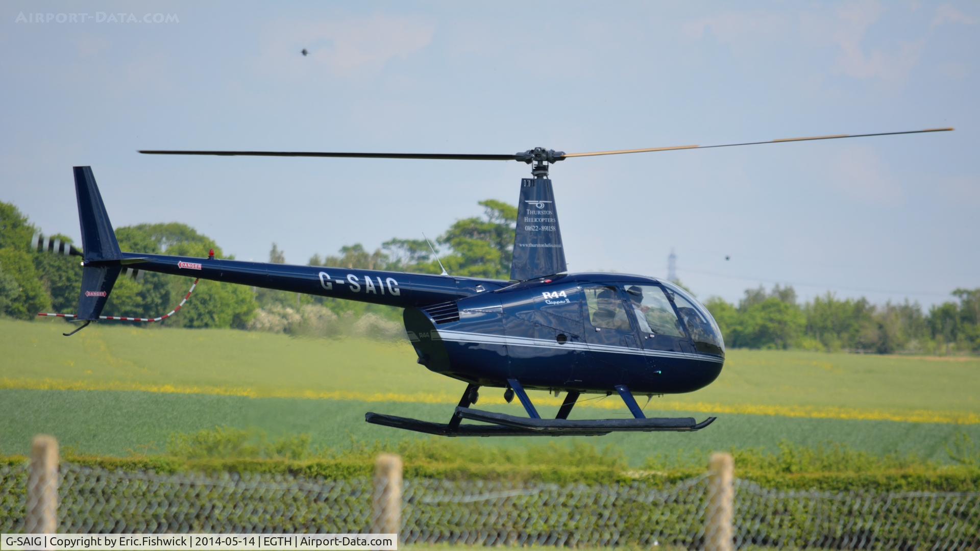 G-SAIG, 2006 Robinson R44 II C/N 11364, 42. G-SAIG preparing to depart Shuttleworth (Old Warden) Aerodrome.