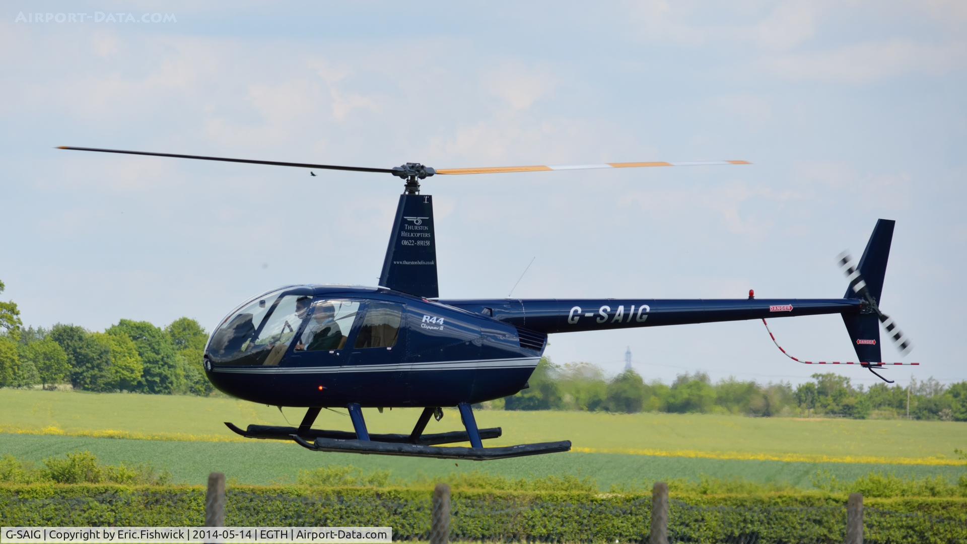 G-SAIG, 2006 Robinson R44 II C/N 11364, 41. G-SAIG preparing to depart Shuttleworth (Old Warden) Aerodrome.