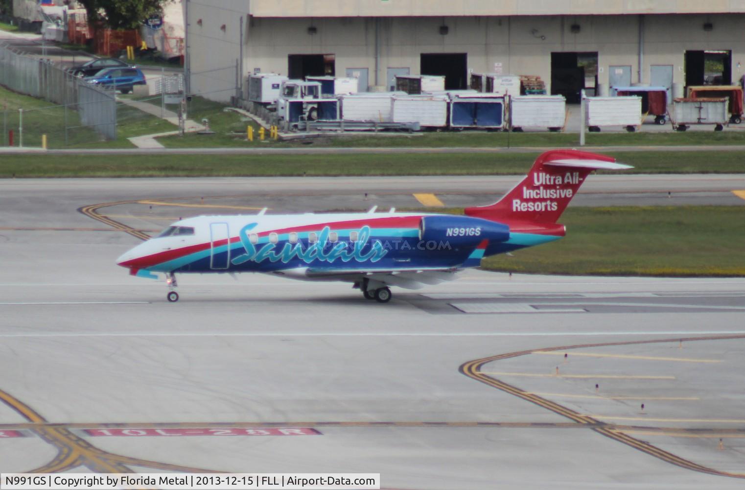 N991GS, 2006 Bombardier Challenger 300 (BD-100-1A10) C/N 20099, and Beaches on this side