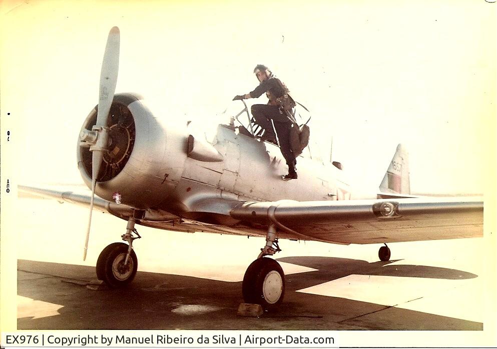 EX976, 1941 North American AT-6D Harvard III C/N 88-15056 (41-33949), T-6 c/n 88-15056 now in UK ex Portuguese Air Force 1657, during the period 1956/1977. This pic was taken in Oct/1970 during my pilot course. The base was B.A.7 in S. Jacinto.