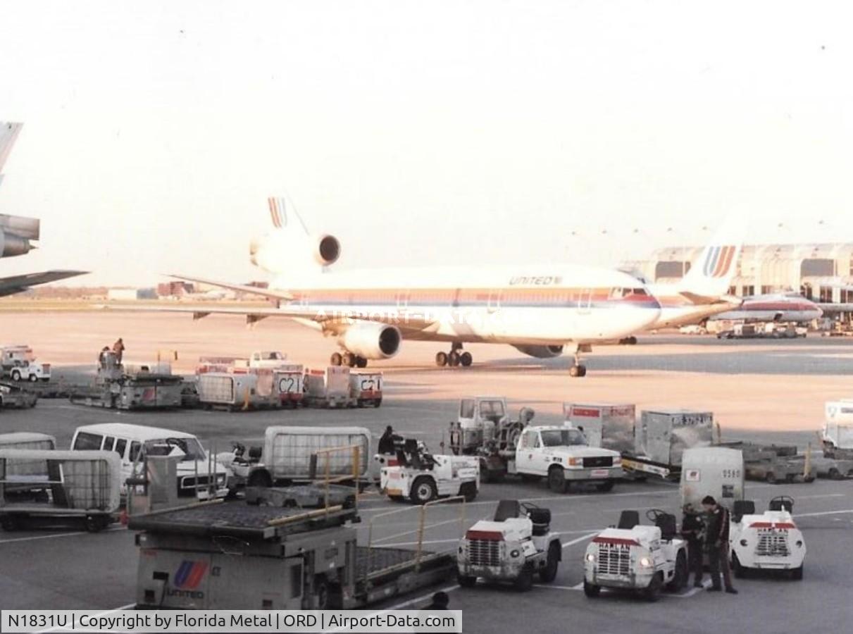 N1831U, 1975 McDonnell Douglas MD-10-10F C/N 46630, United DC-10-10 taken back around 1988, sorry about the bad scan - United DC-8 behind it
