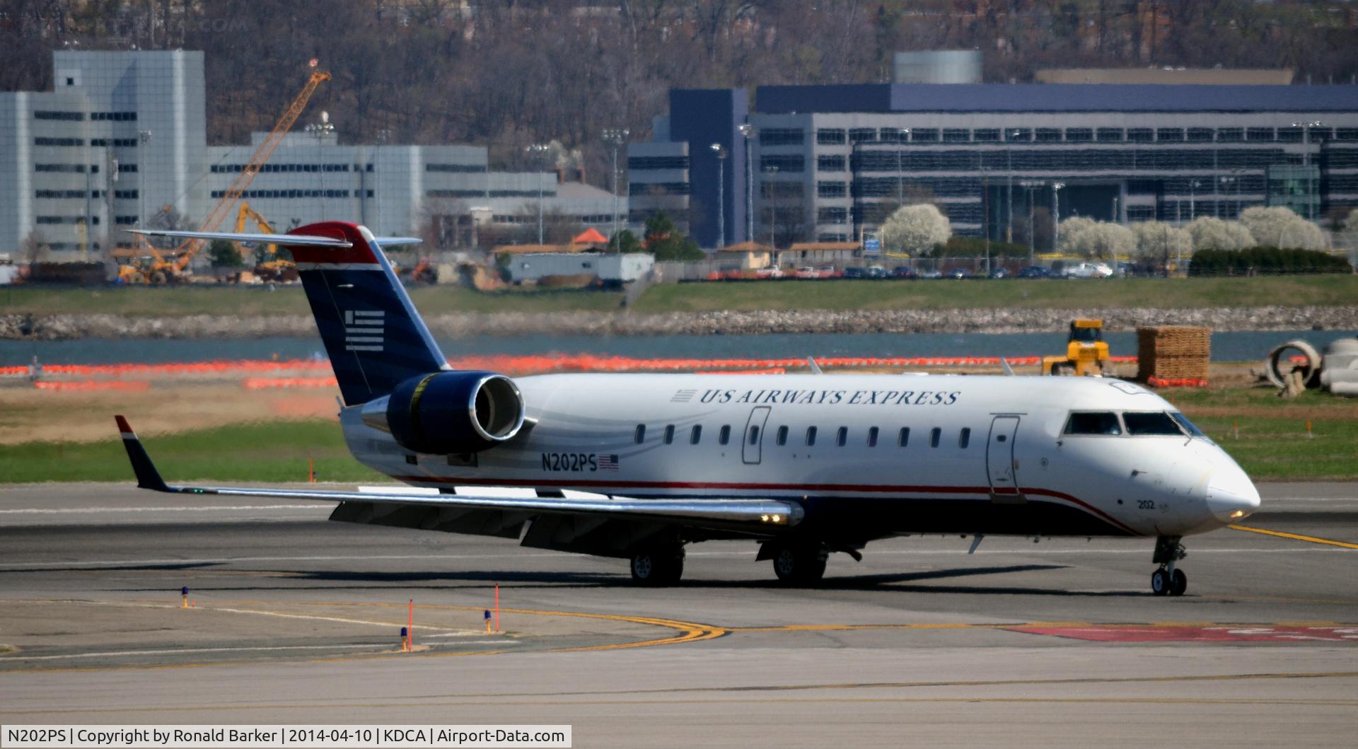 N202PS, 2003 Bombardier CRJ-200ER (CL-600-2B19) C/N 7858, Taxi National
