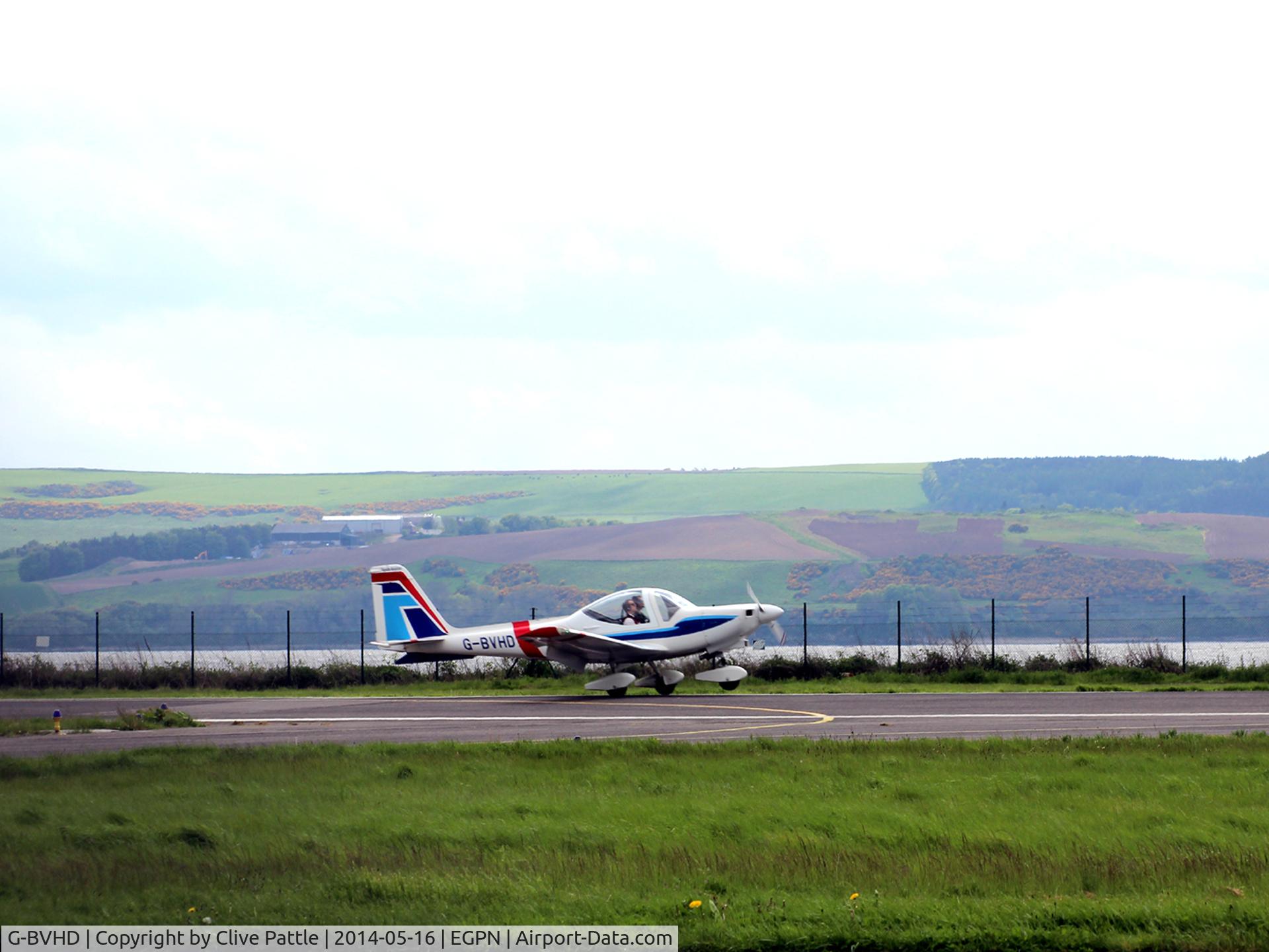 G-BVHD, 1994 Grob G-115D-2 C/N 82006, One of the aircraft of based Tayside Aviation Ltd landing alongside the River Tay with the hills of The Kingdom of Fife in the background.