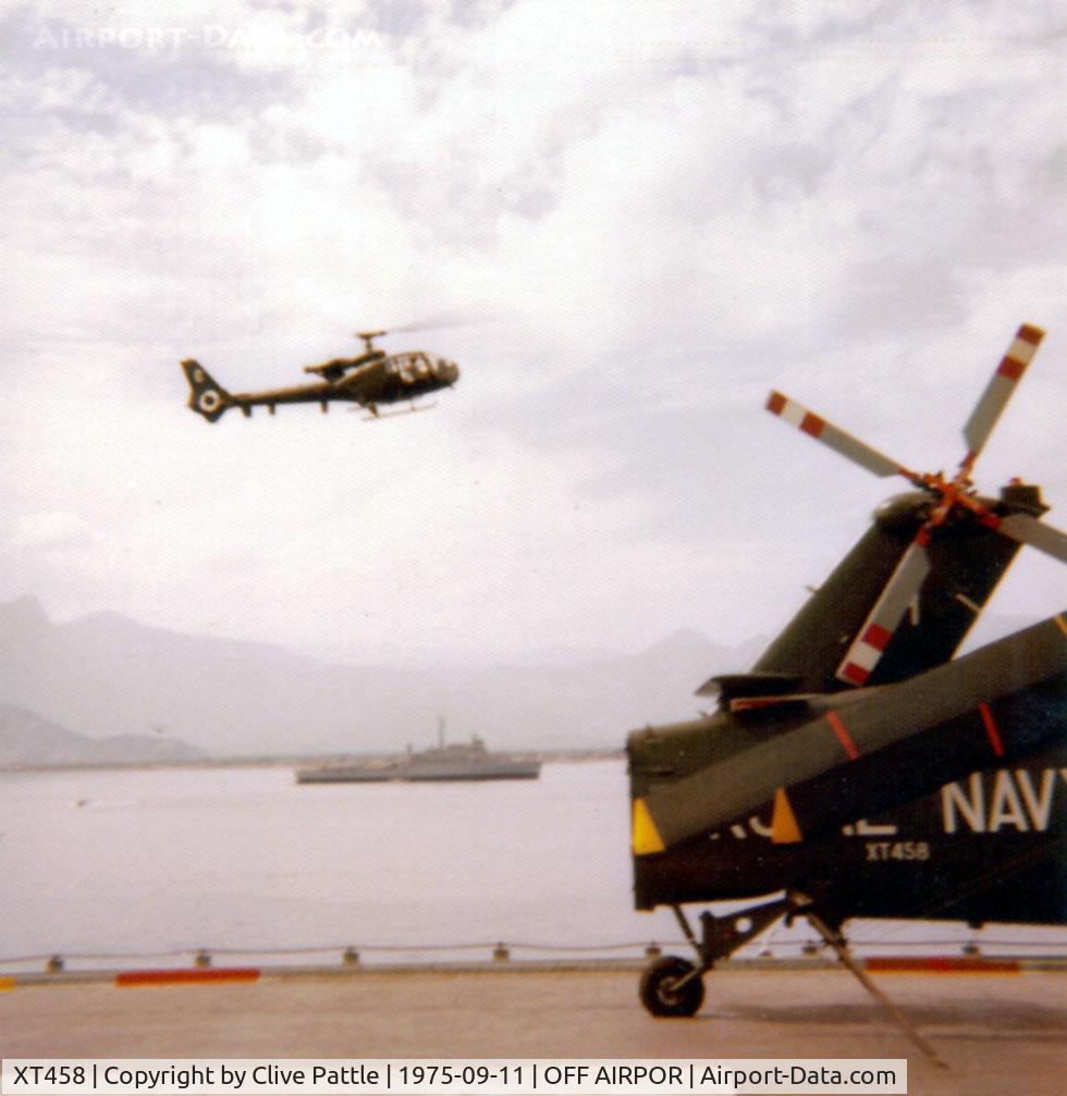 XT458, 1965 Westland Wessex HU.5 C/N WA280, Taken onboard HMS Hermes off Antalya, Turkey,  during Exercise Deep Express'75. Gazelle AH.1 behind is coded 'G' from 3 Commando Brigade Air Squadron. Royal Marines,  HMS Fearless in background.