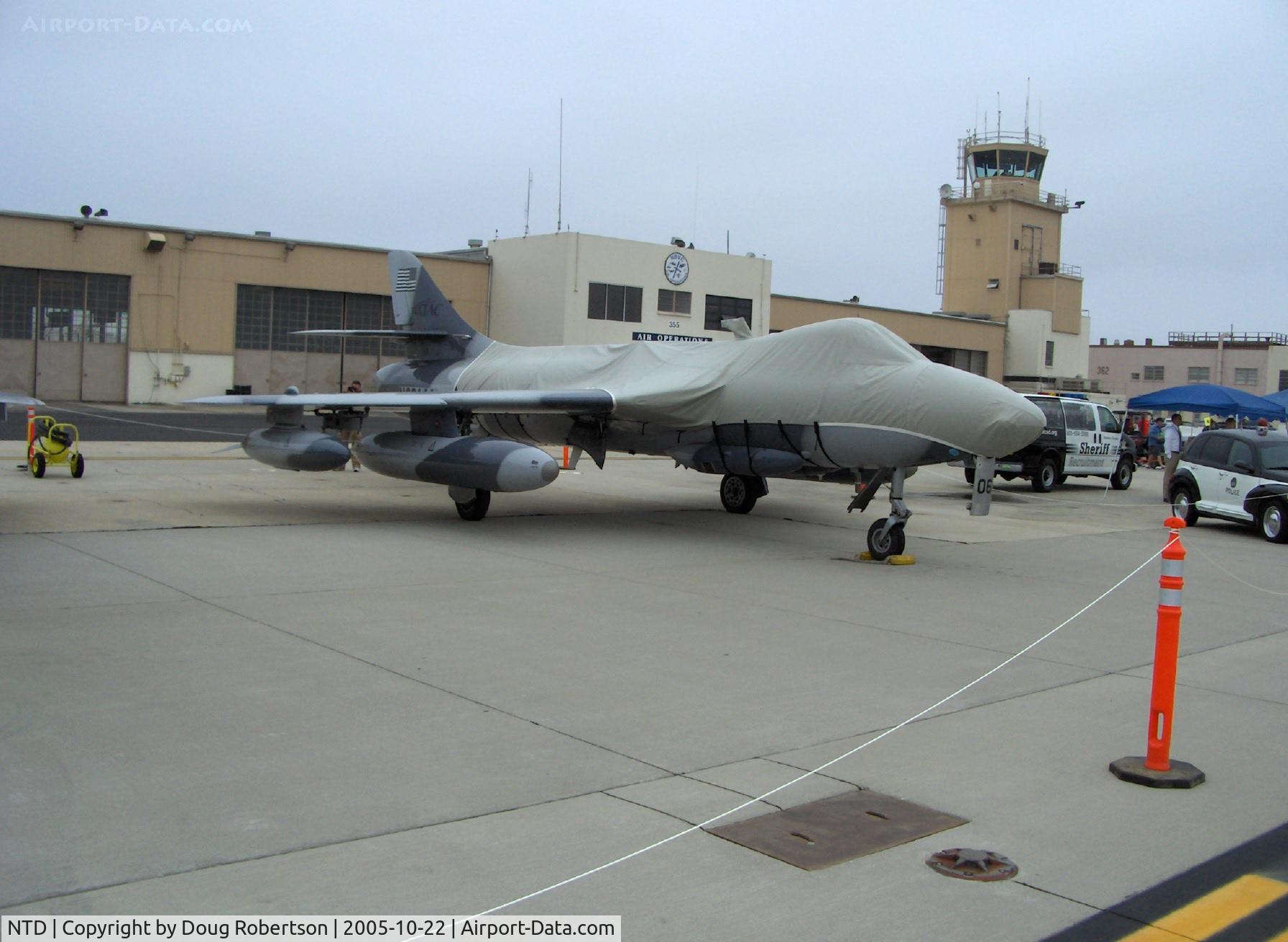 Point Mugu Nas (naval Base Ventura Co) Airport (NTD) - Naval Base Ventura County, NAWS Point Mugu Control Tower. N321AX, Hawker HUNTER F Mk 58 aggressor aircraft in foreground