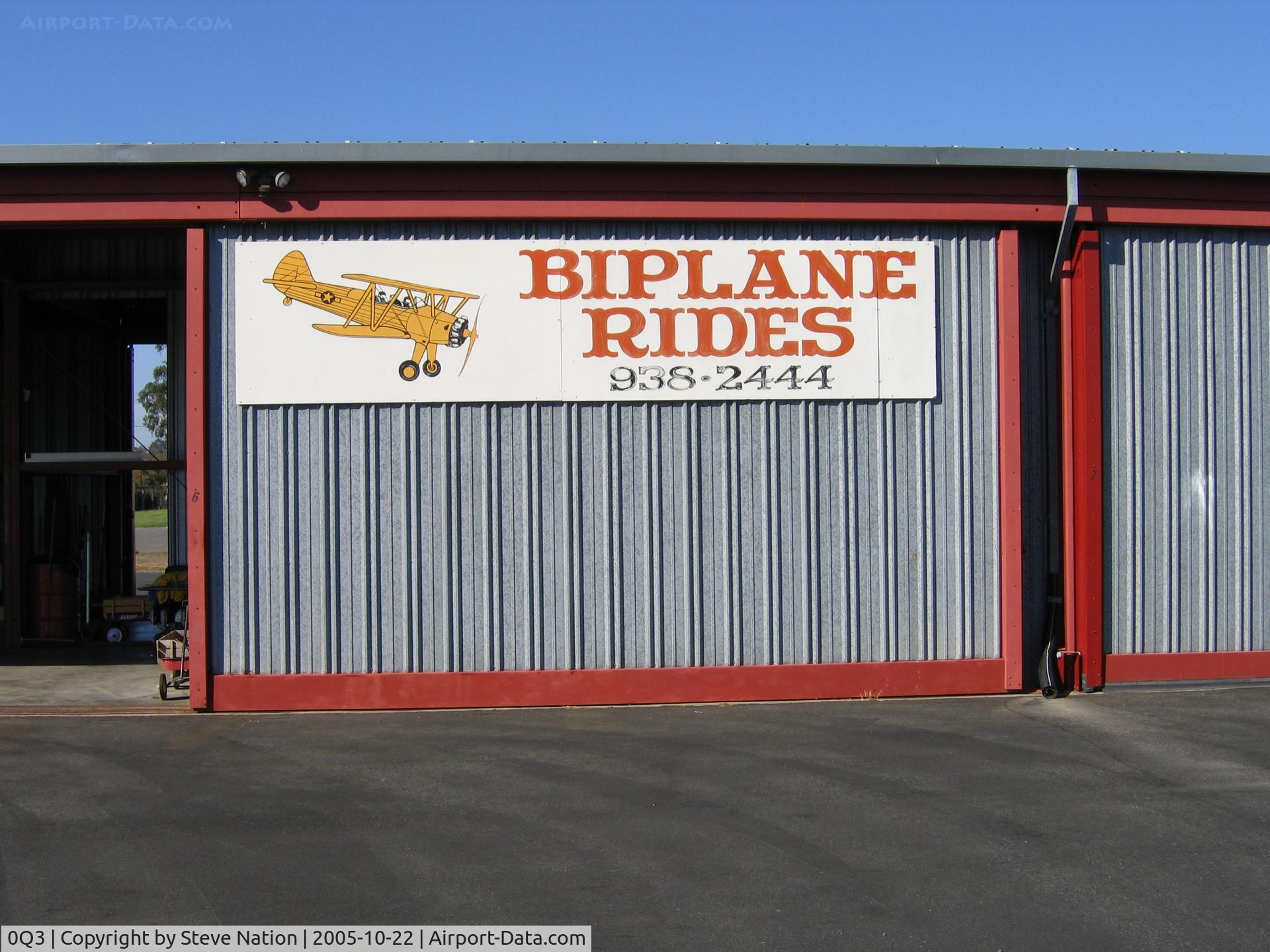 Sonoma Valley Airport (0Q3) - Biplane Rides hangar and sign at Sonoma Valley Airport, Schellville, CA (operator has three PT-17 Stearmans)
