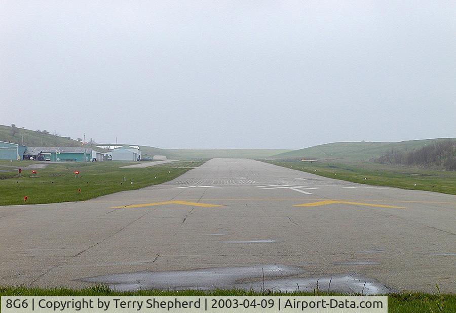 Harrison County Airport (8G6) - Sloped runway on a hazy day...