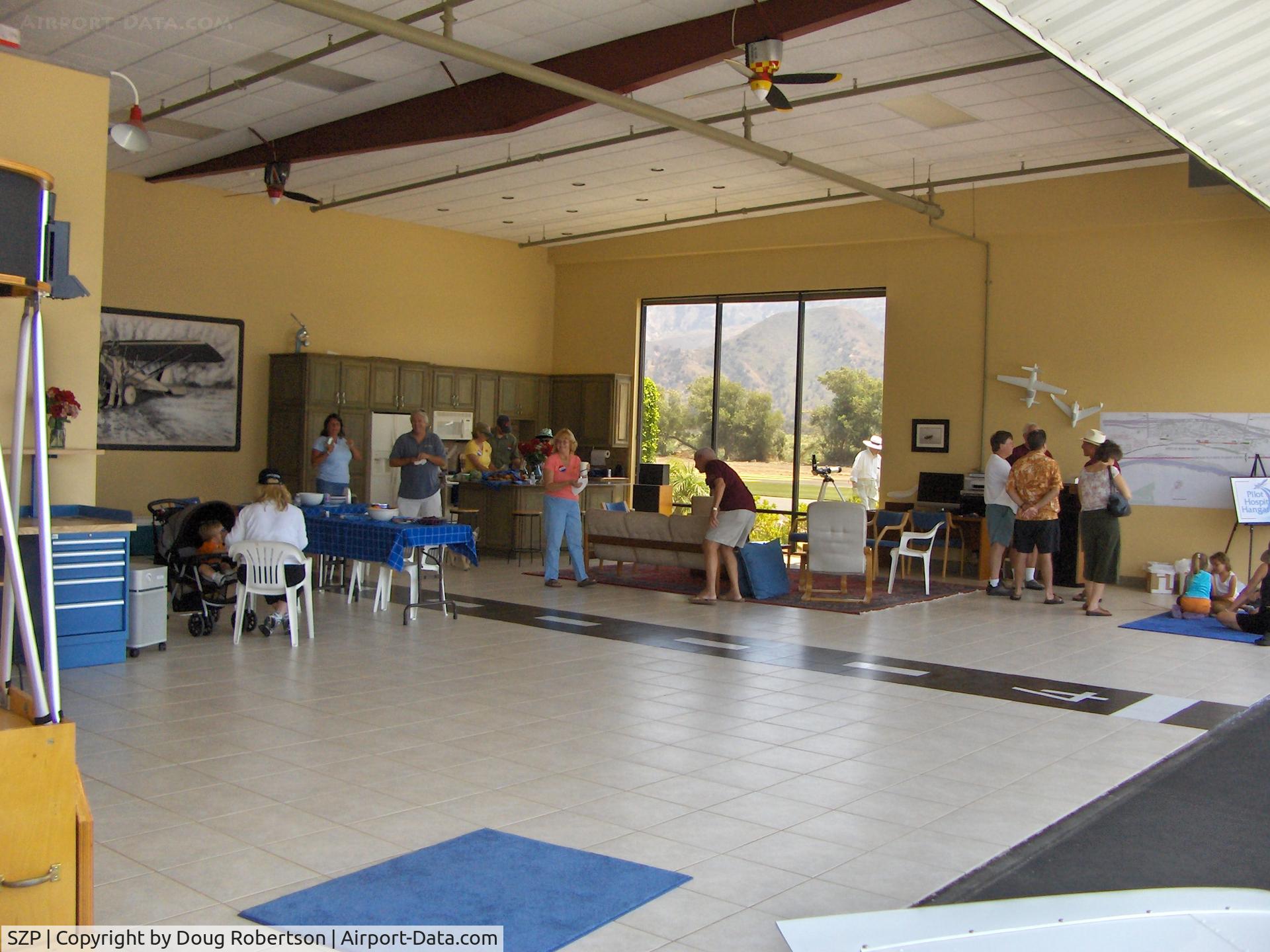 Santa Paula Airport (SZP) - Aviation Museum of Santa Paula, Hangar 6, The McWilliams immaculate hangar. (N110AM Zlin 242L, aerobatic aircraft occupant rolled out on ramp)