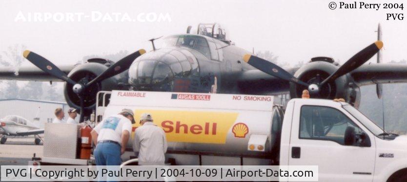 Hampton Roads Executive Airport (PVG) - Hampton Roads Executive's fuel truck servicing a thirsty B-25J