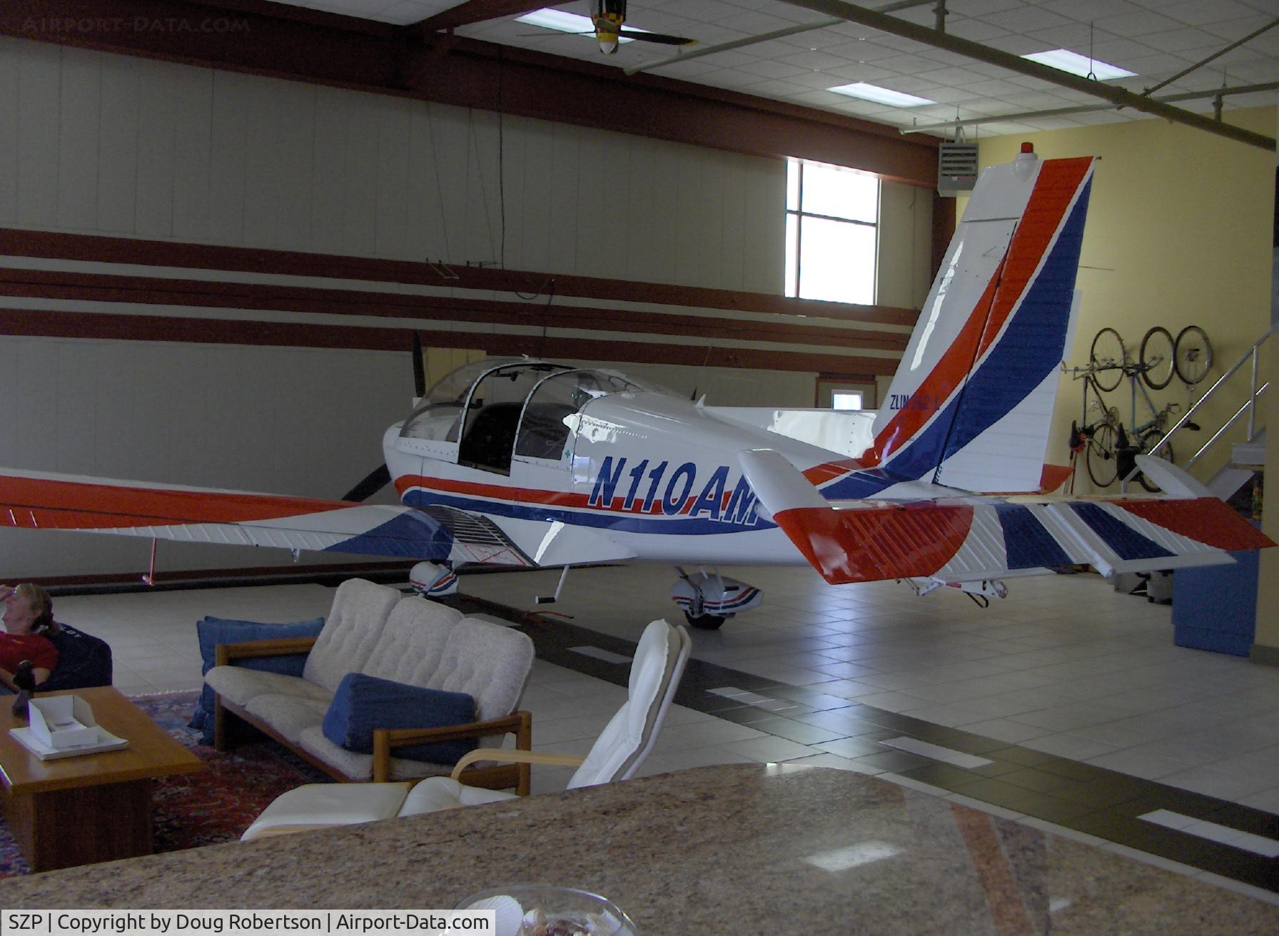 Santa Paula Airport (SZP) - Aviation Museum of Santa Paula, Hangar 6, The McWilliams hangar with aerobatic Moravan Zlin Z242L, N110AM inside. See N110AM for more aircraft photos