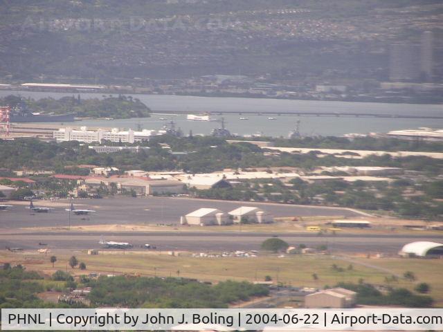 Honolulu International Airport, Honolulu, Hawaii United States (PHNL) - Hickam AFB ramp at Honolulu Intl Airport. Arizona Memorial in background. Taken on final to rnwy 8L