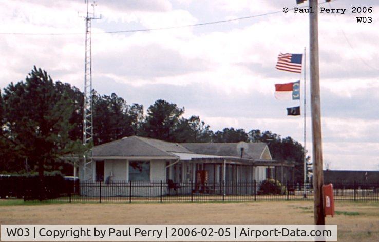 Wilson Industrial Air Center Airport (W03) - Admin/Terminal seen from the parking apron