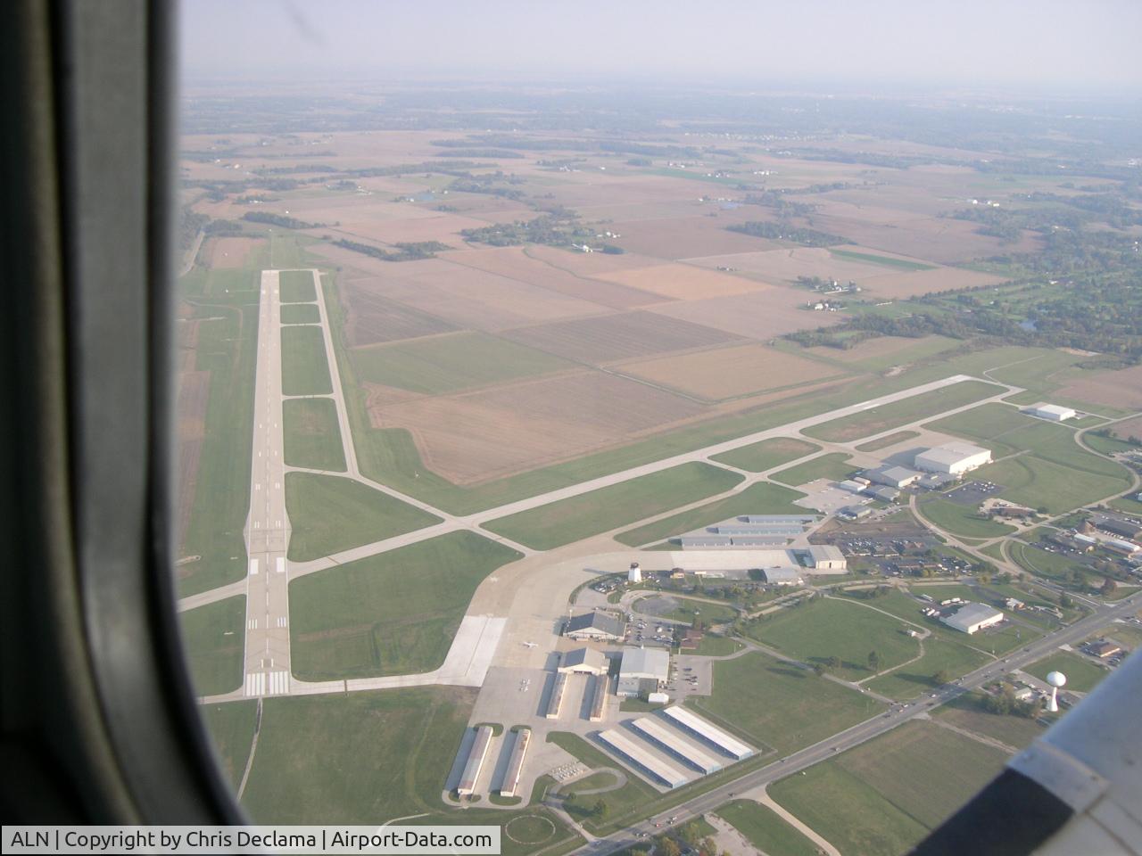St Louis Regional Airport (ALN) - Leaving the area after a few touch and gos in a C.152.  Summer 2005