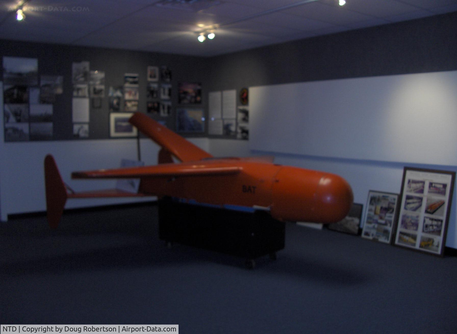 Point Mugu Nas (naval Base Ventura Co) Airport (NTD) - BAT, early 1.000 lb. glide bomb in pilotless small aircraft launched from USN PBY CATALINA or PB4Y-2 PRIVATEER aircraft, successful use against Japanese ships-WWII. Outmoded by Atomic Bomb. Termed 
