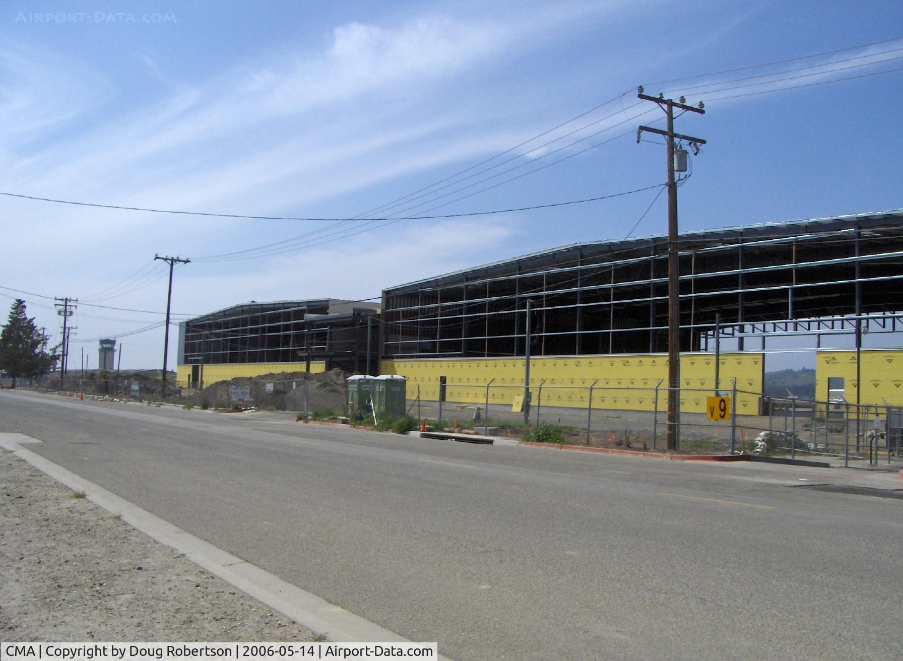 Camarillo Airport (CMA) - New corporate aircraft maintenance hangars under construction, 27,000 sq. ft. each with 28 foot overhead door clearance. Note FAA Control Tower in left background.