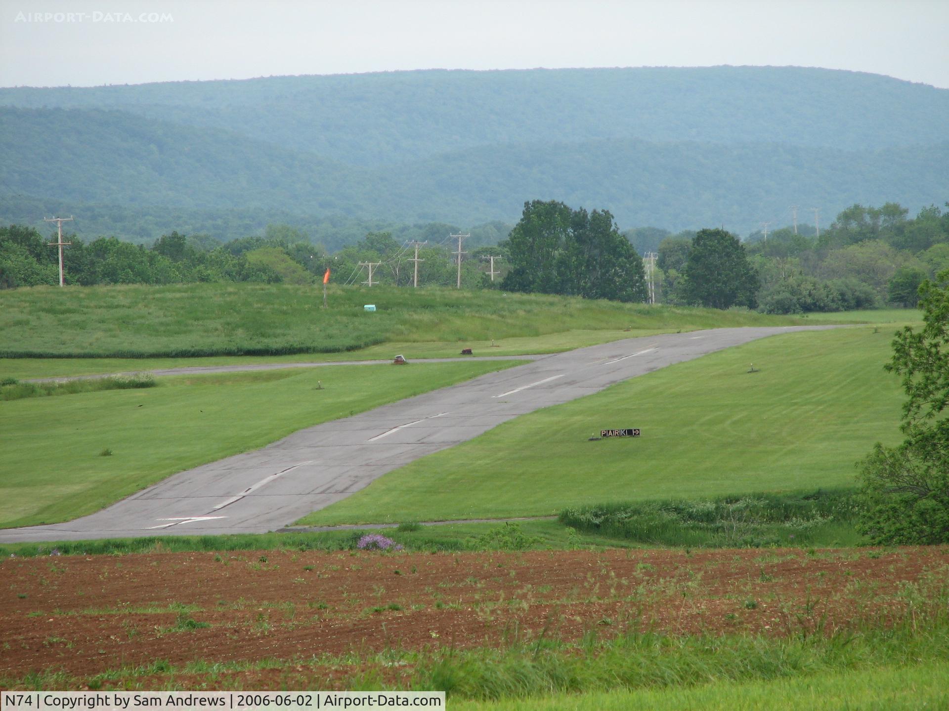 Penns Cave Airport (N74) - approach end to rwy7 from the next hill over