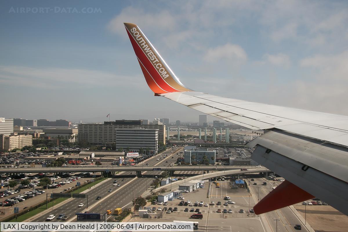 Los Angeles International Airport (LAX) - Onboard Southwest Airlines N767SW (FLTSWA1124) from Las Vegas McCarran Int'l (KLAS) on final approach to RWY 24R, just after crossing Sepulveda Blvd, seconds from touchdown, looking south.