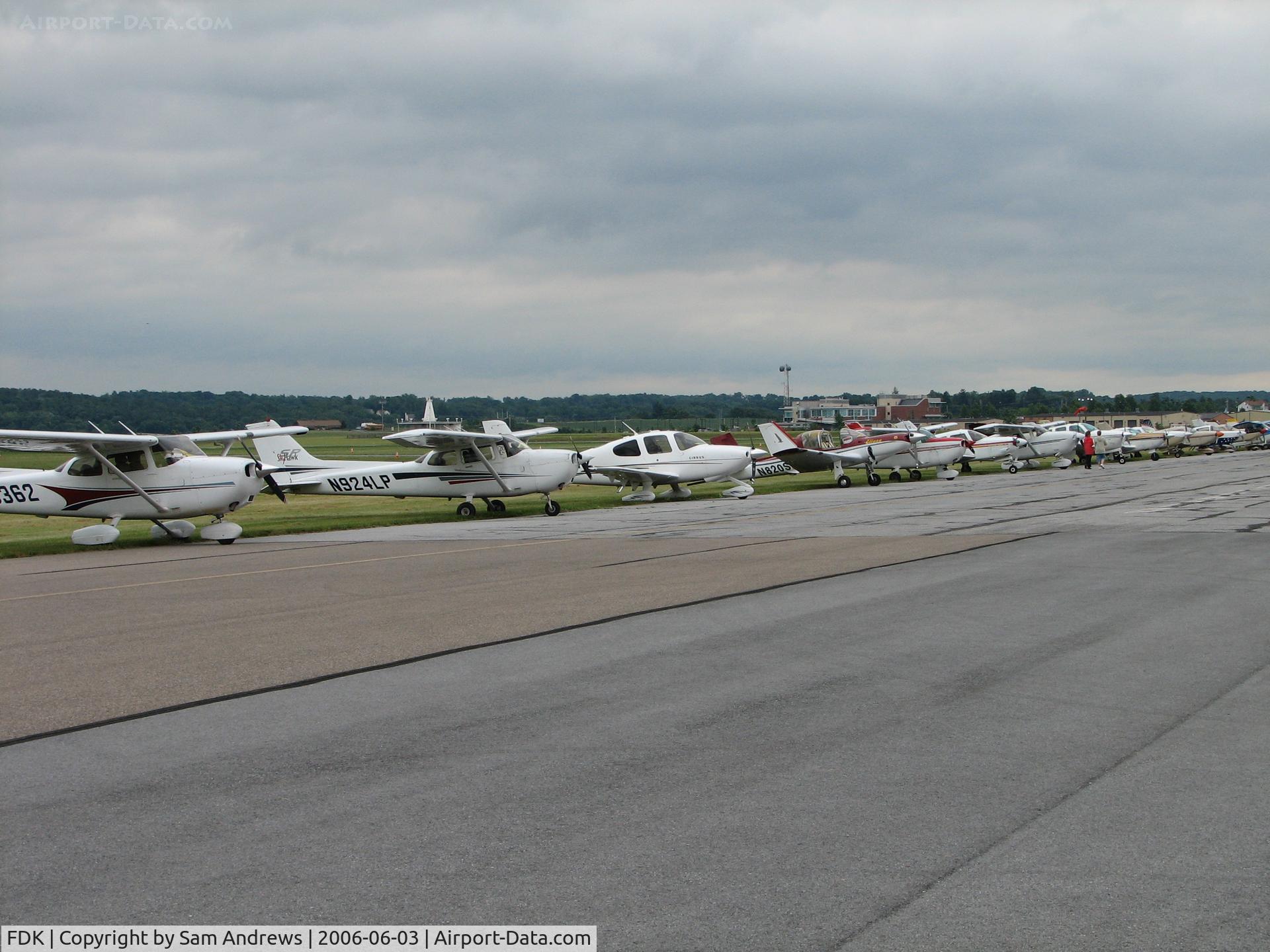 Frederick Municipal Airport (FDK) - IF the weather had been better the morning of the 2006 AOPA Fly-In I'm certain there would have been more airplanes.  There were more to my left and behind but there would have been more