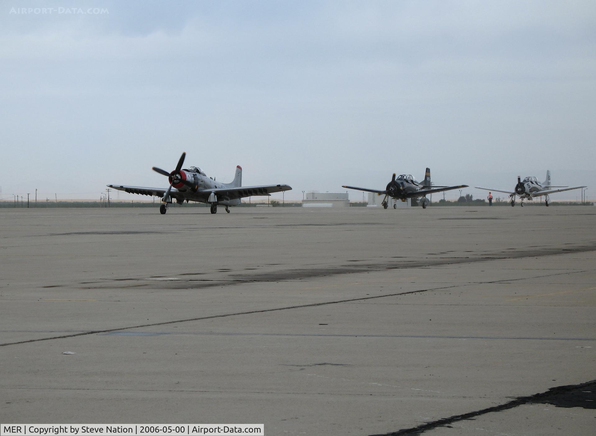 Castle Airport (MER) - AD-4N(A) NX965AD, T-28C N528TC and T-28C NX757K arriving at 2006 West Coast Formation Clinic held on expansive old SAC ramp @ Castle AFB