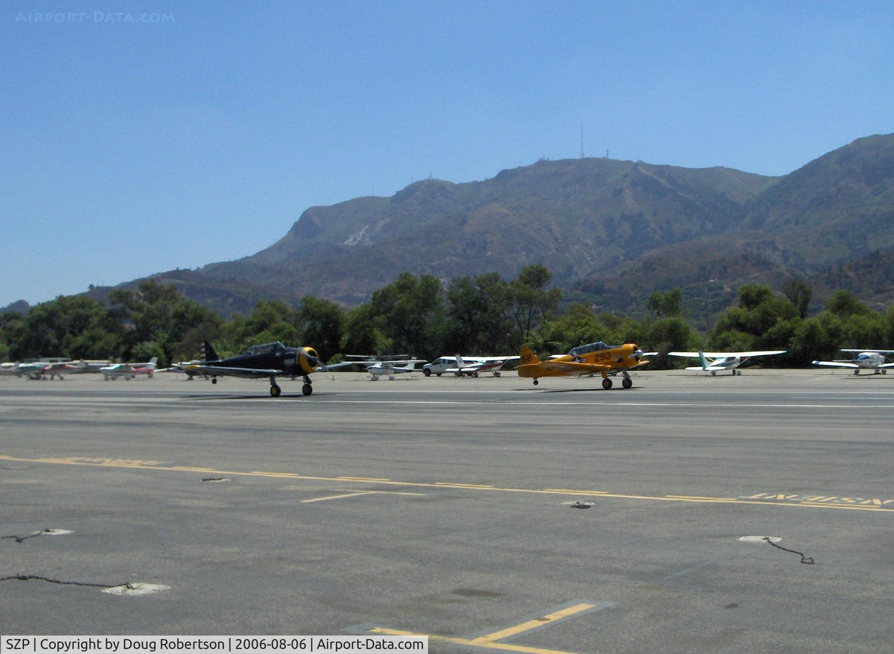 Santa Paula Airport (SZP) - Tandem takeoff N8540P AT-6D & N89014 SNJ-5, on 60' wide Runway 22