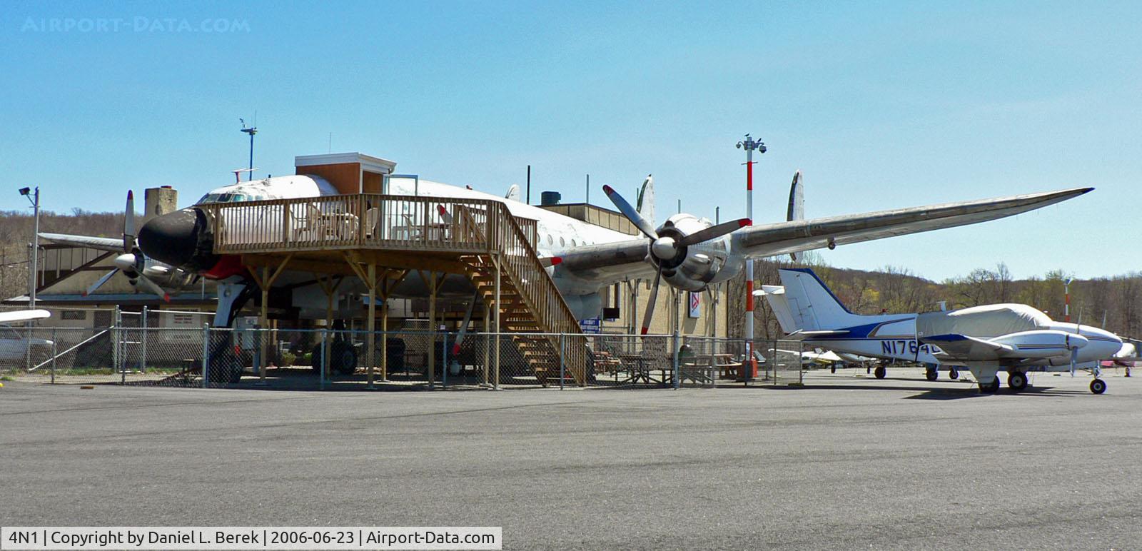 Greenwood Lake Airport, The oldest preserved Lockheed Constellation houses the pilot shop at Greenwood Lake; a restaurant and adminisrative offices are in the building behind.
