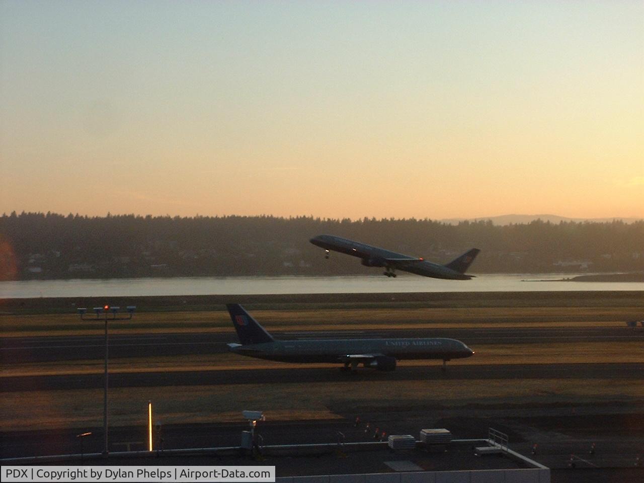 Portland International Airport (PDX) - Two UA 757-200's in one frame.