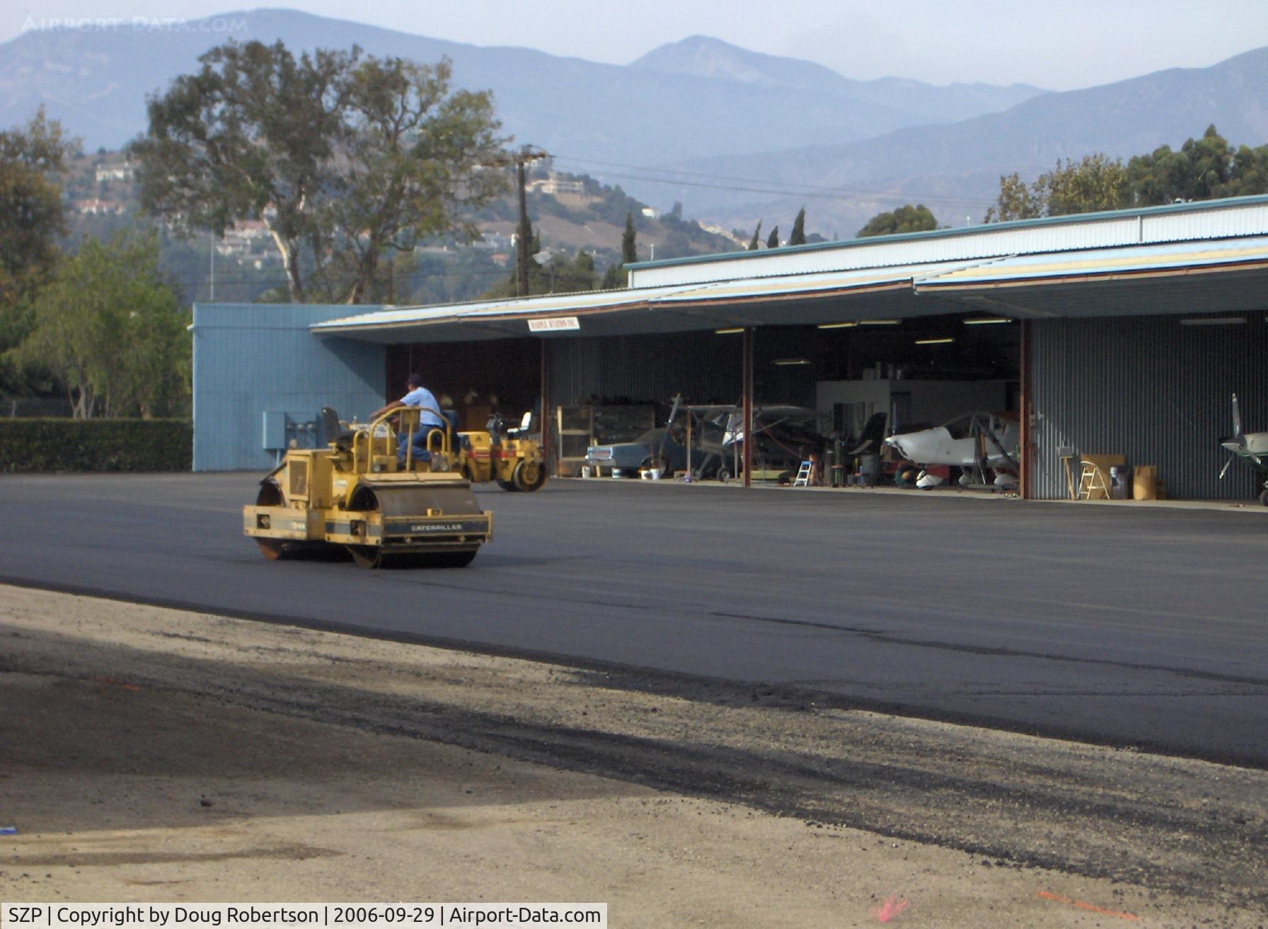 Santa Paula Airport (SZP) - Grading newly resurfaced asphalt aircraft ramp