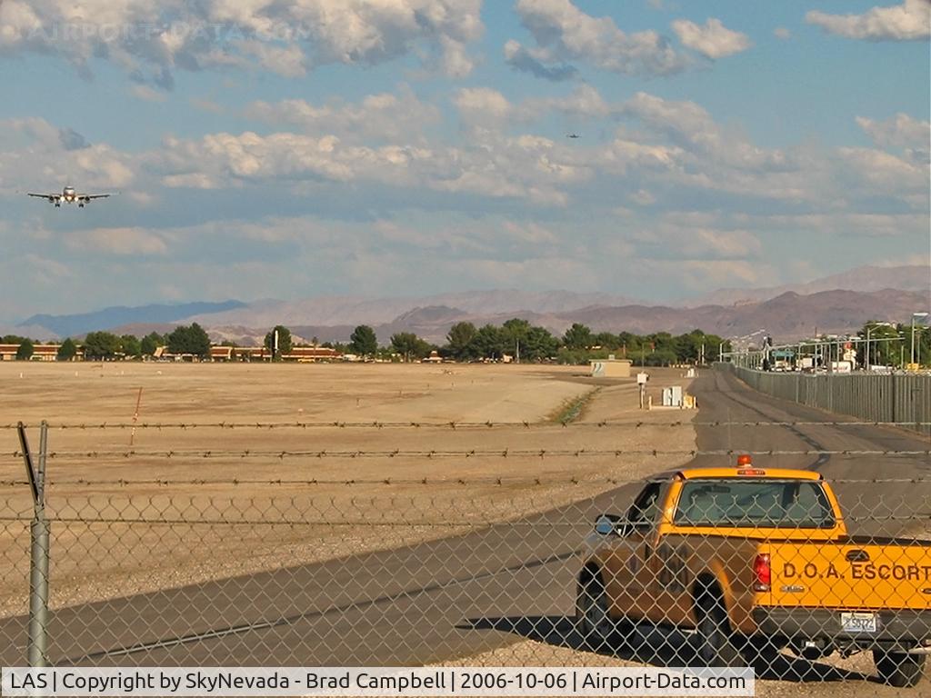 Harry Reid International Airport (LAS) - Sunset Viewing area facing East. US Airways N835AW and Virgin Atlantic G-VXLV on approach.