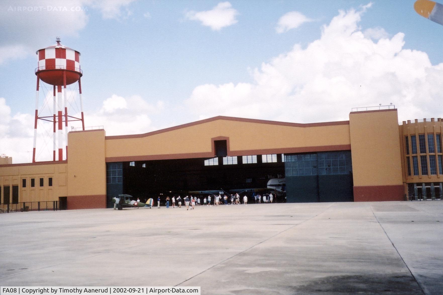 Orlampa Inc Airport (FA08) - Fantasy of Flight main display hangar.  The notch in the center was designed in so a B-29 get into this building.