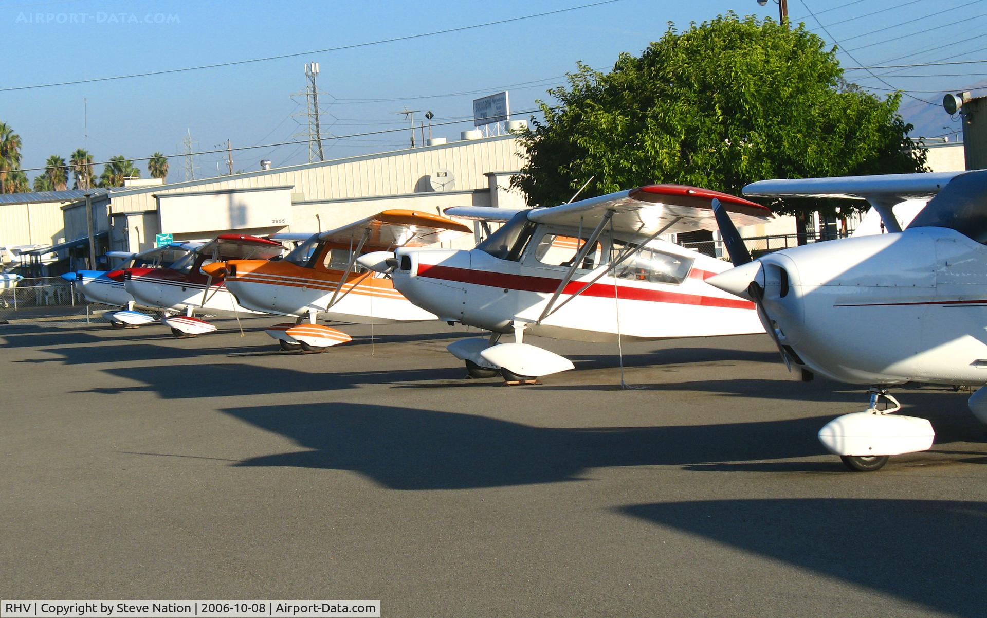 Reid-hillview Of Santa Clara County Airport (RHV) - Cessna 172 watching over line-up of tail draggers on Amelia Reid Aviation ramp @ Reid-Hillview Airport (San Jose), CA