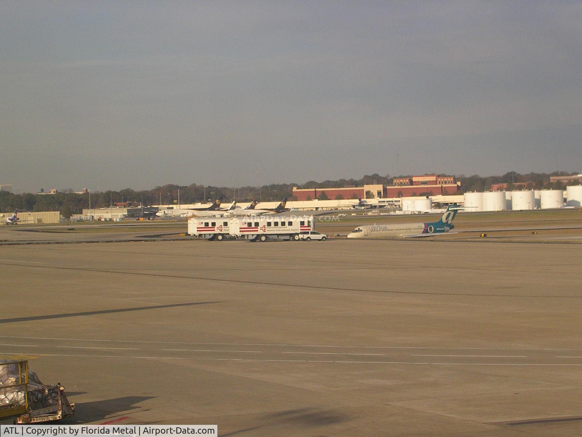 Hartsfield - Jackson Atlanta International Airport (ATL) - a couple of the transporters in the distance
