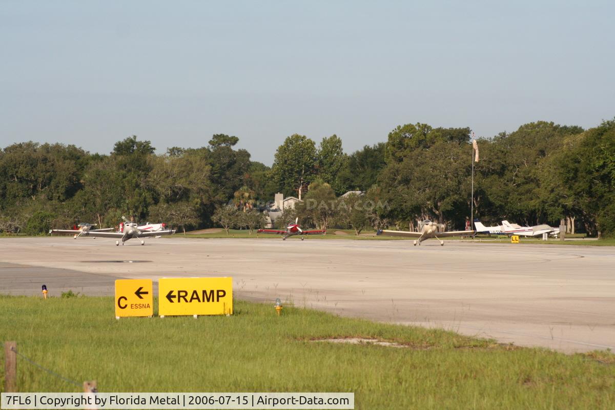 Spruce Creek Airport (7FL6) - Vans RV planes line up for take off