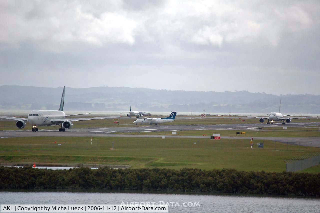 Auckland International Airport, Auckland New Zealand (AKL) - A 320-200, two B 767-300, and a DHC 8 - all of Air NZ - at home